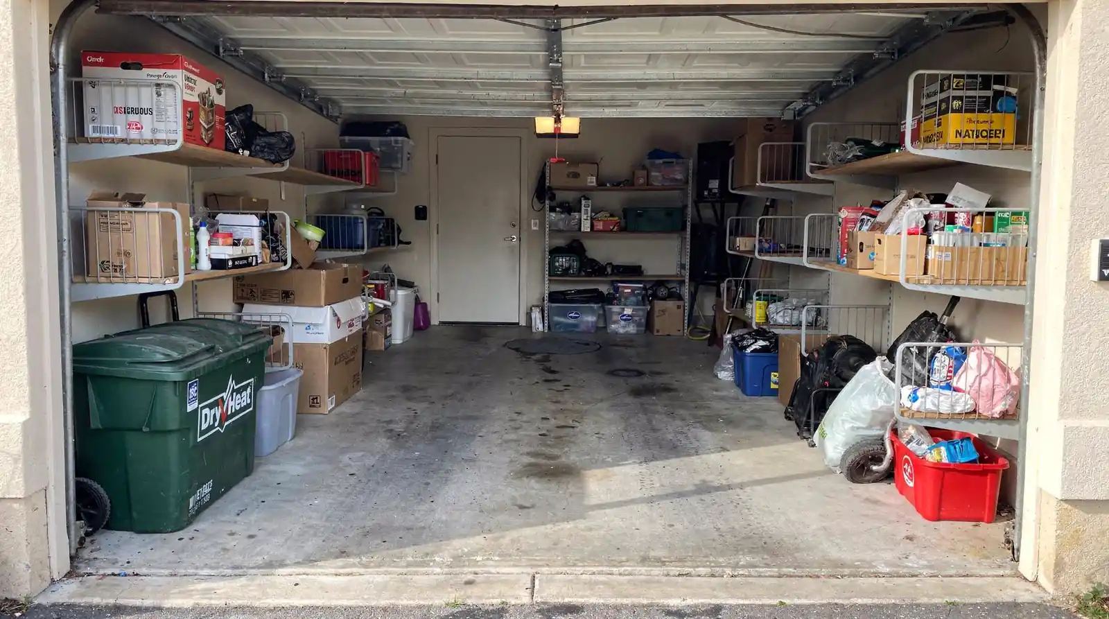 Choosing a layout that puts storage on walls and vertical racks frees the garage floor